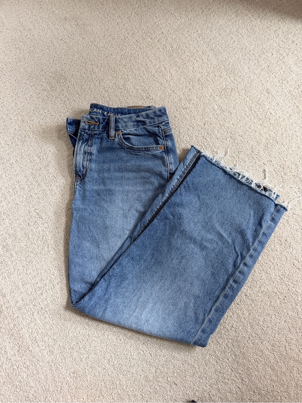American Eagle Outfitters Medium Blue Stovepipe Jeans with Frayed Hem